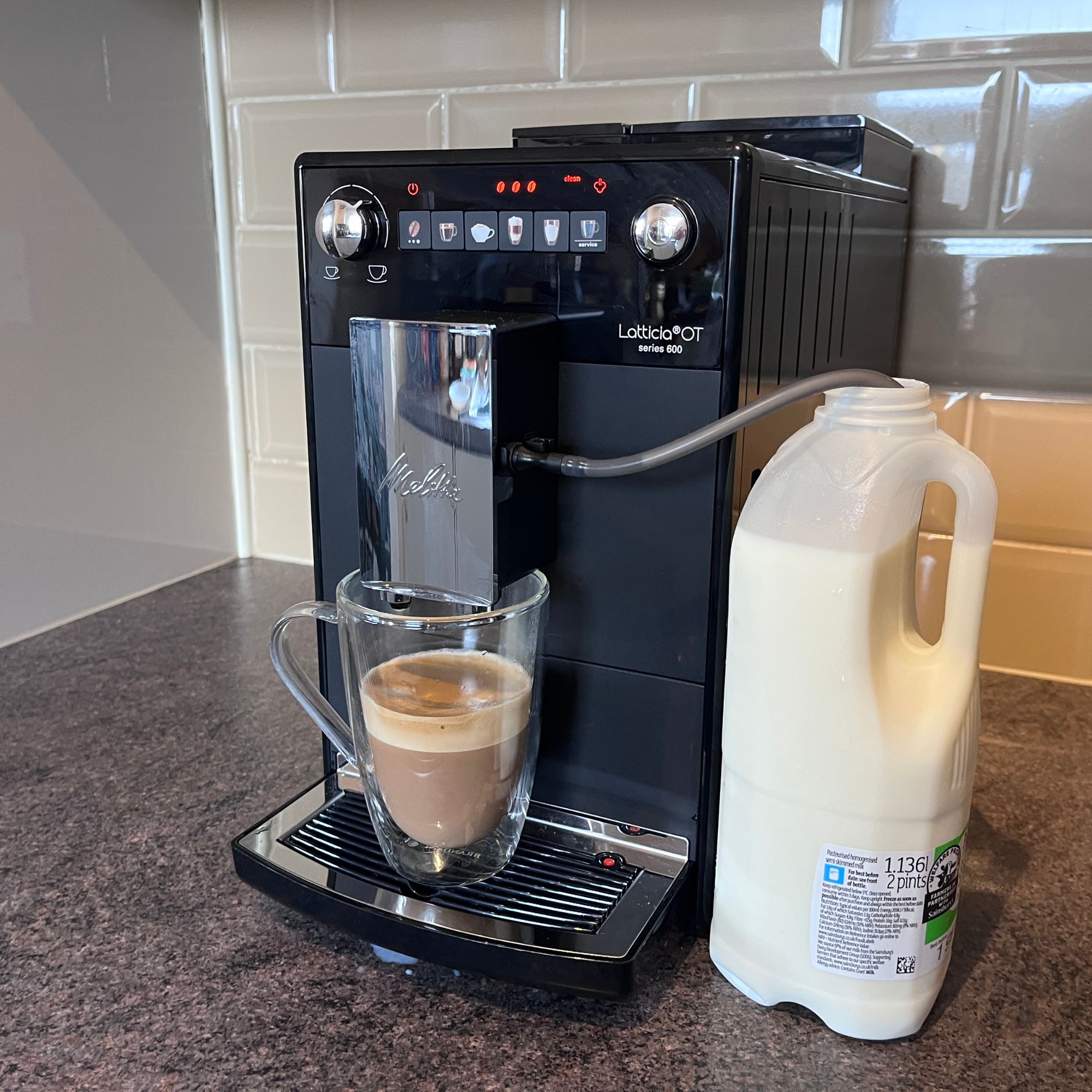 Melitta Latticia OT Bean-to-Cup Coffee Machine making a cappuccino