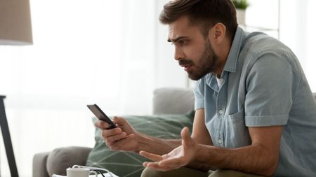 Annoyed man with phone