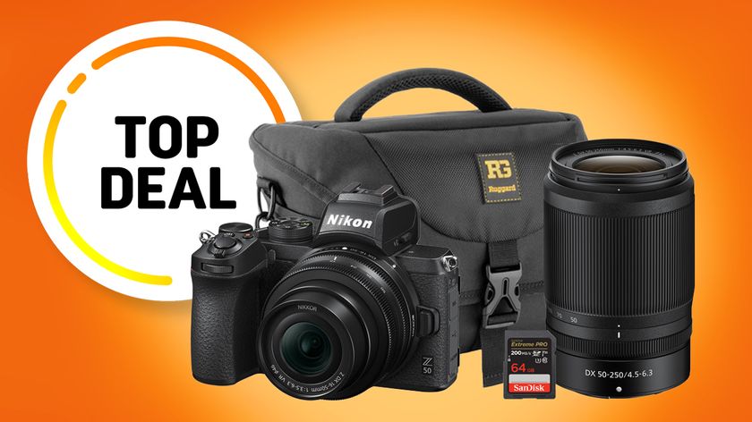 Nikon Z50 camera kit featuring a camera, lens, bag, and SanDisk 64GB memory card, set against a bright orange background with &quot;Top Deal&quot; text