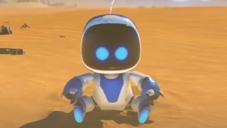 Astro Bot sitting in the sand in the Sony PlayStation 5 game Astro Bot