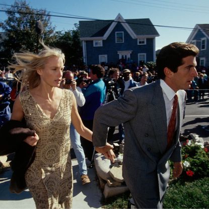 John F. Kennedy, Jr. and Daryl Hannah attend a wedding in Rhode Island