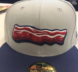 Baseball team puts bacon all over their uniforms