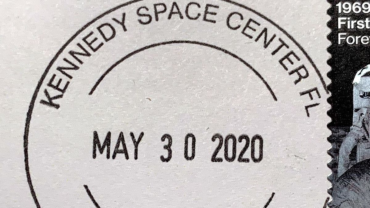 a stamp that reads &quot;kennedy space center&quot;