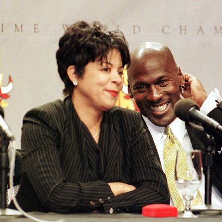 michael jordan of the chicago bulls r laughs as