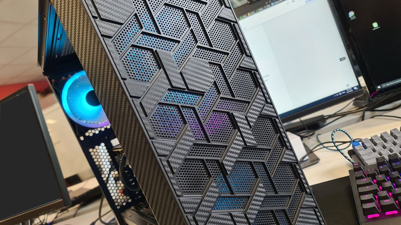 Budget PC case on a desk, including those from Aerocool, Bitfinix, and Kolink