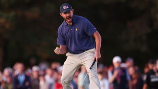 Patrick Cantlay celebrates his winning putt in the four-ball at the Presidents Cup