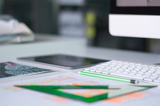 iPad and Mac on desk