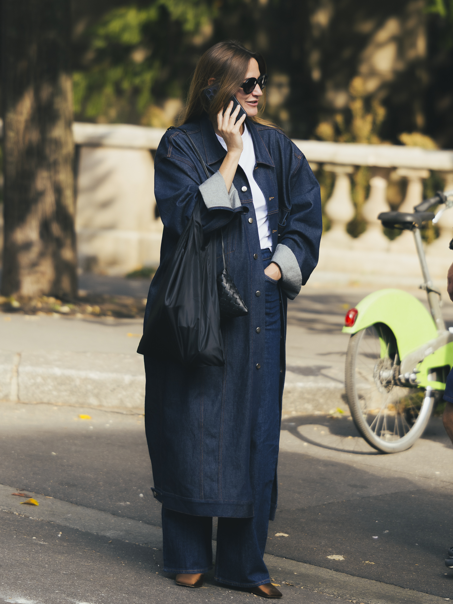 showgoer at Paris Fashion Week wearing French girl denim