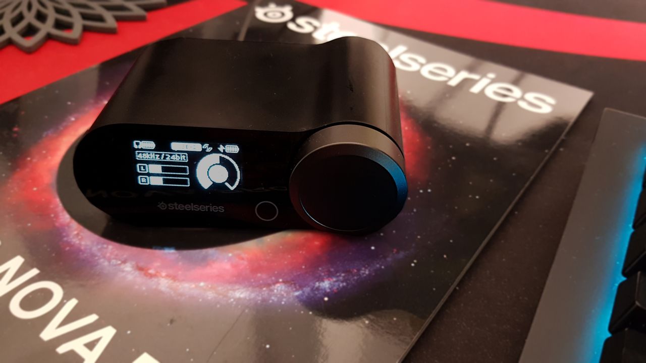 The SteelSeries Arctis Nova Pro wireless game DAC on a desk.