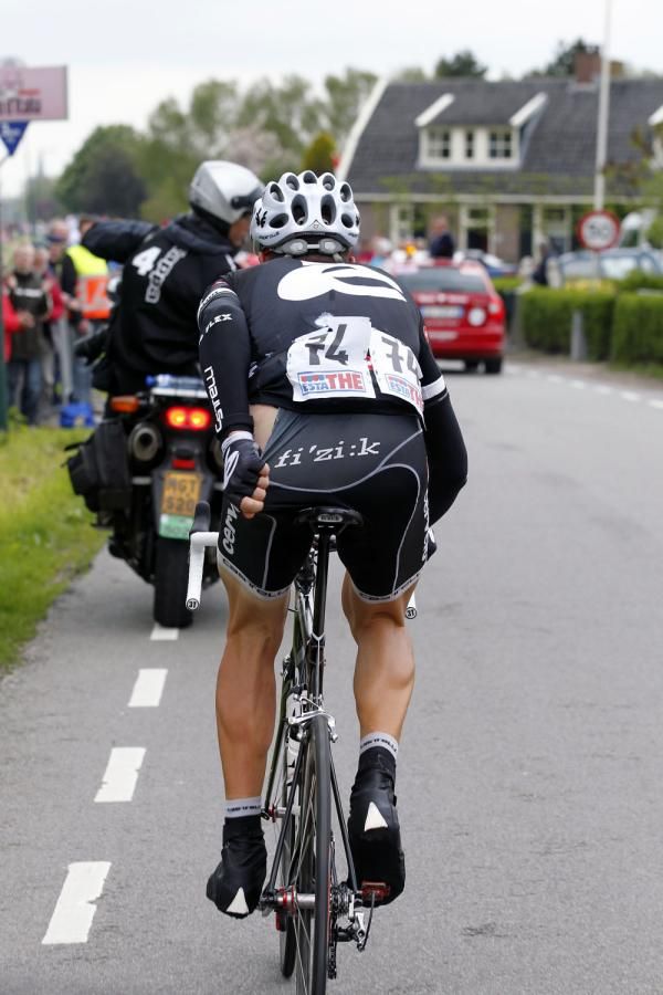 Ted King (Cervelo TestTeam) attempts to cover the damage of a crash during stage two