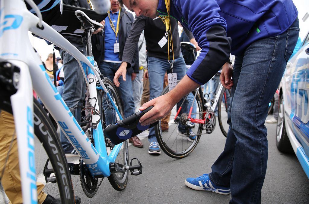 Checks for hidden motors were a common site at the 2016 Tour