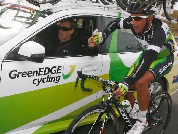 A GreenEdge rider back at his team car.