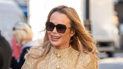 Amanda Holden is seen leaving Global Studios, Heart Breakfast Show and and boarding the Heart Breakfast Christmas Party bus on December 11, 2025 in London, United Kingdom