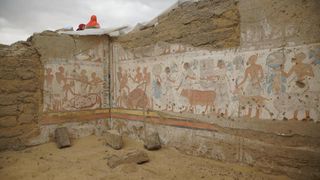 Wall paintings were found in the tomb. The best preserved shows cattle and other animals being led to slaughter.