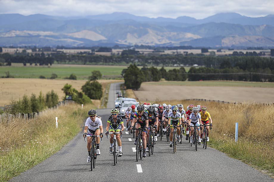 The peloton begin the first big climb of the day