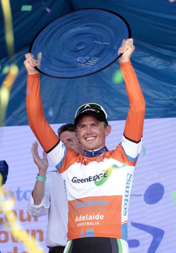 Simon Gerrans (GreenEdge) shows off his prize.