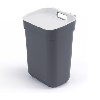 A grey bin with a white lid
