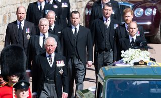 Prince Charles, Prince of Wales, Prince Andrew, Duke of York, Prince Edward, Earl of Wessex, Prince William, Duke of Cambridge, Peter Phillips, Prince Harry, Duke of Sussex, Earl of Snowdon David Armstrong-Jones and Vice-Admiral Sir Timothy Laurence follow Prince Philip, Duke of Edinburgh's coffin during the Ceremonial Procession during the funeral of Prince Philip, Duke of Edinburgh on April 17, 2021 in Windsor,