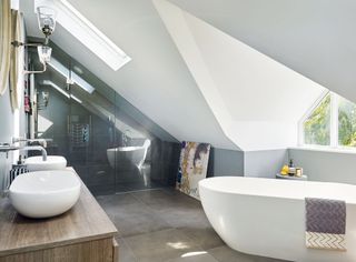 en suite bathroom with freestanding bath