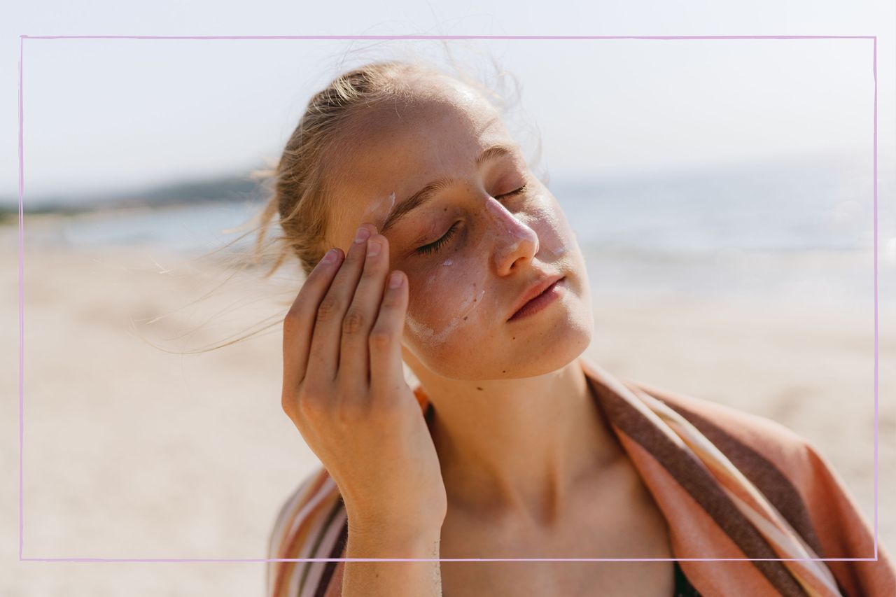 Teenager putting on suncream 