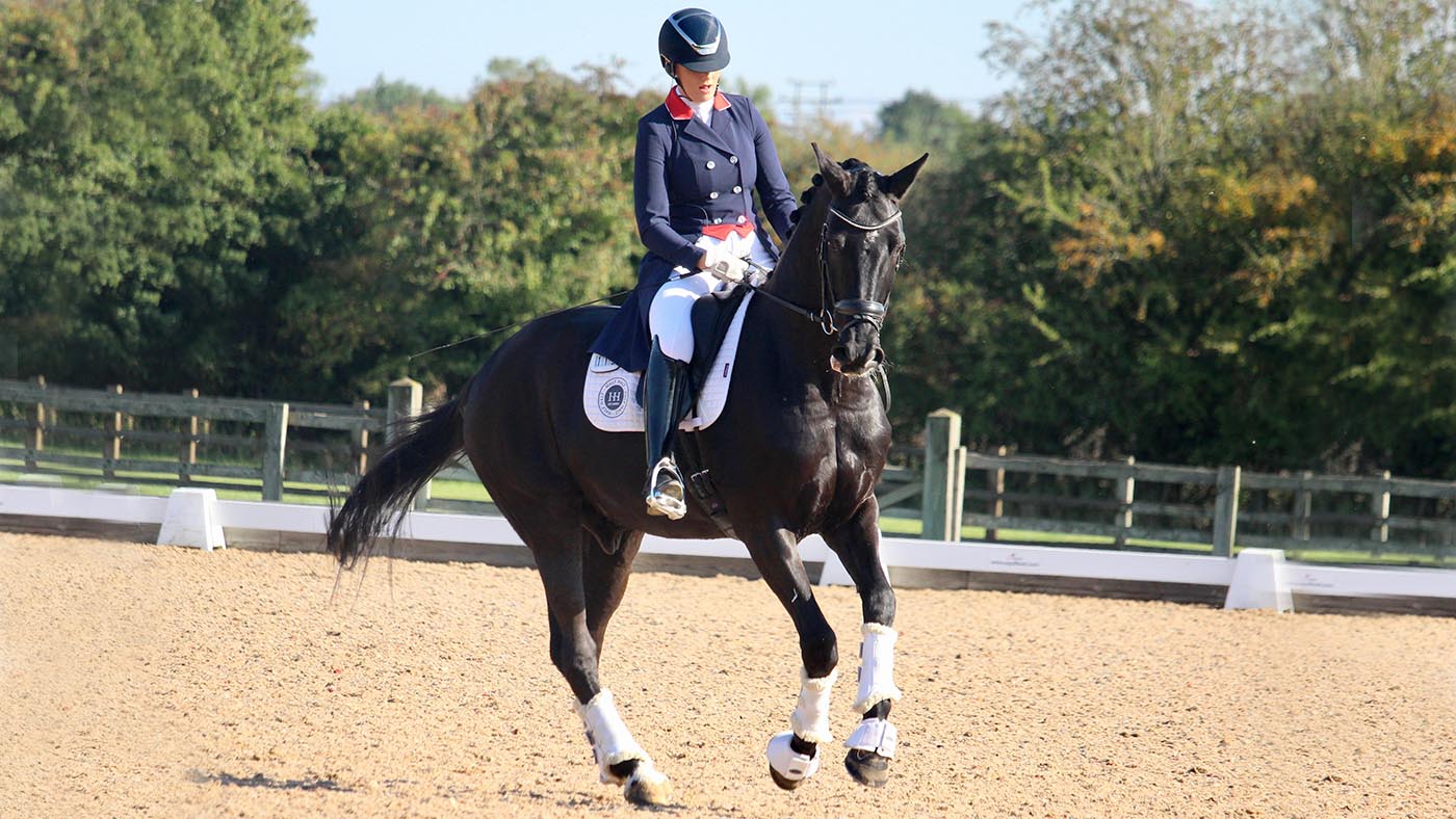 Dressage rider Maddy Frewin on Blue Hors Dexter