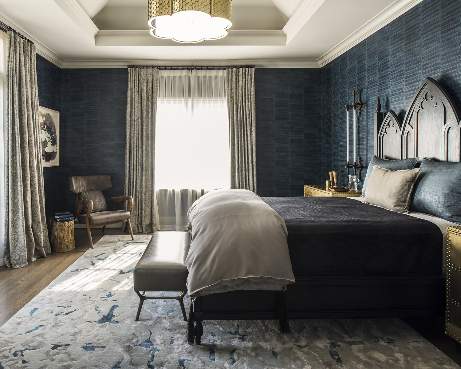 bedroom with blue walls and gray fabrics