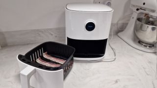 Xiaomi Mi Smart Air Fryer cooking bacon for the first test
