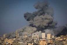 Smoke clouds the air during an Israeli airstrike in Gaza City.