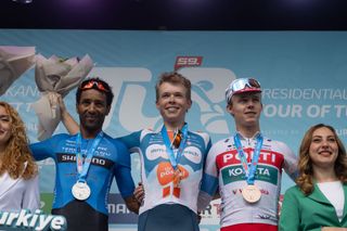 Frank van den Broek celebrated overall victory at the 2024 Tour of Turkey ahead of Merhawi Kudus and Paul Double