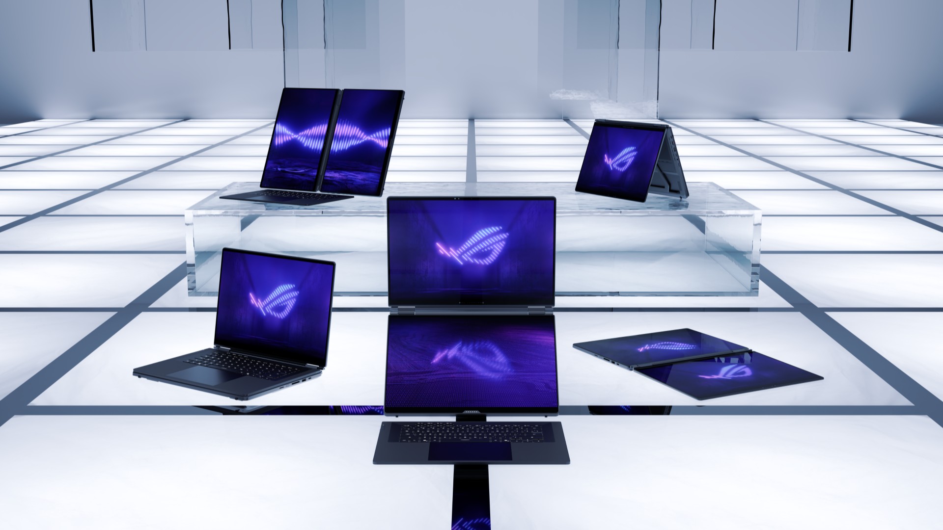 Asus ROG Zephyrus Duo 16 gaming laptops in different styles and setups in a panelled room