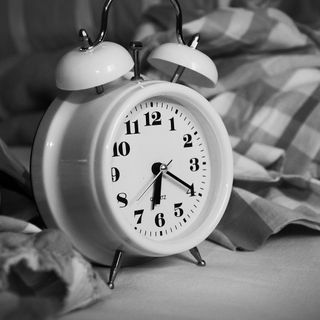 white table clock with alarm