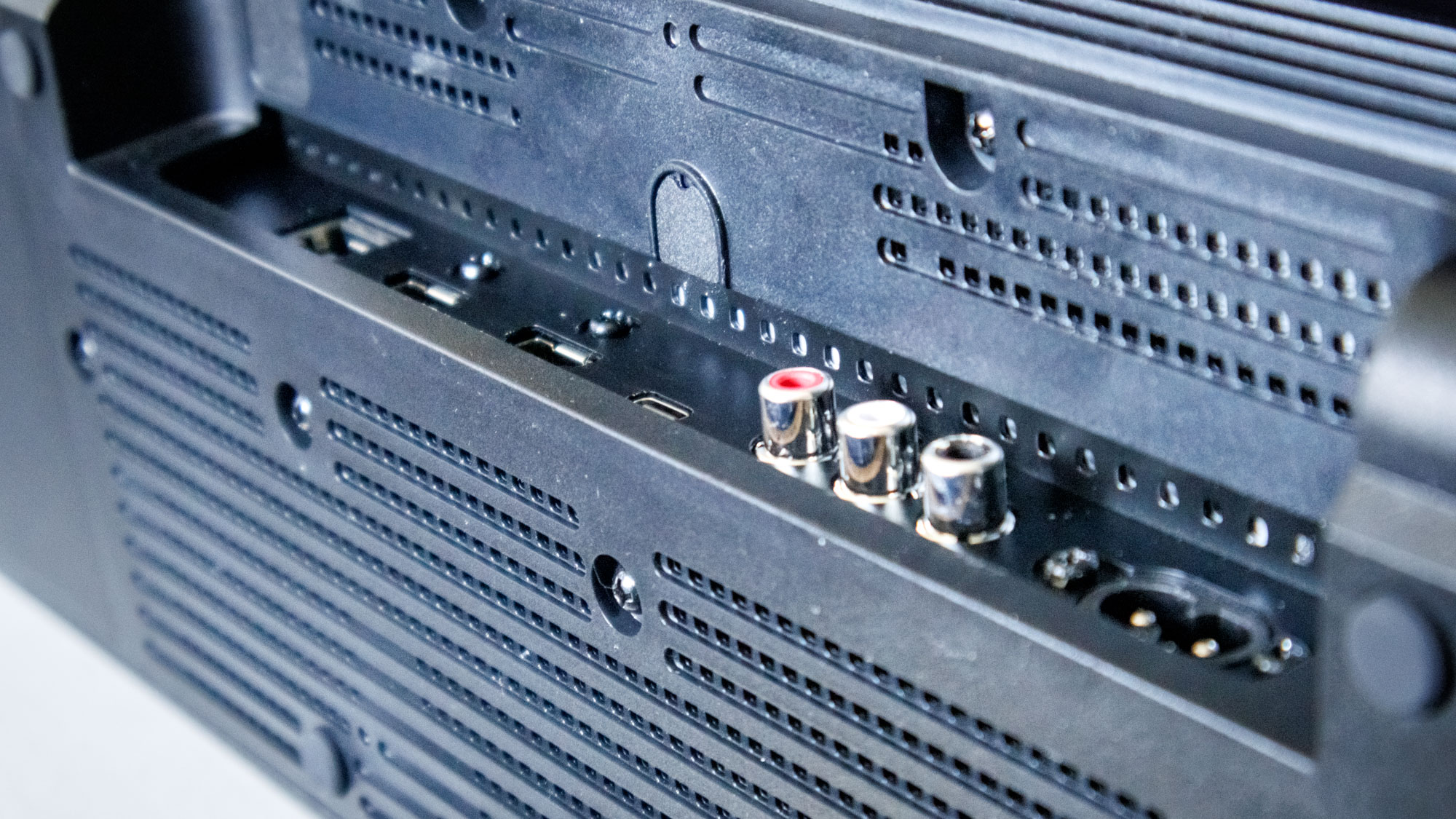 The ports on a Marshall Heston 120 soundbar on a TV stand.