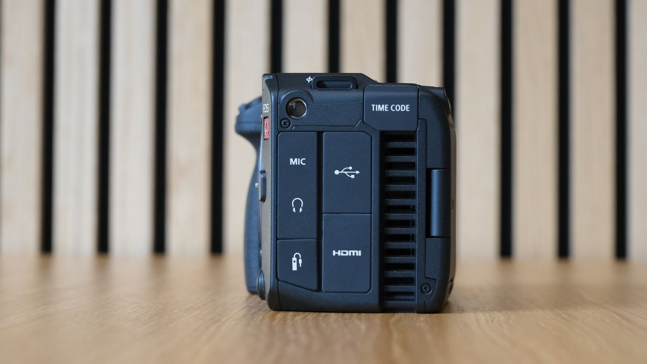 Canon EOS C50 against a striped wooden background