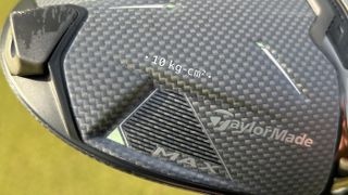 Photo of the 10K logo of the TaylorMade Qi35 Max Driver close up