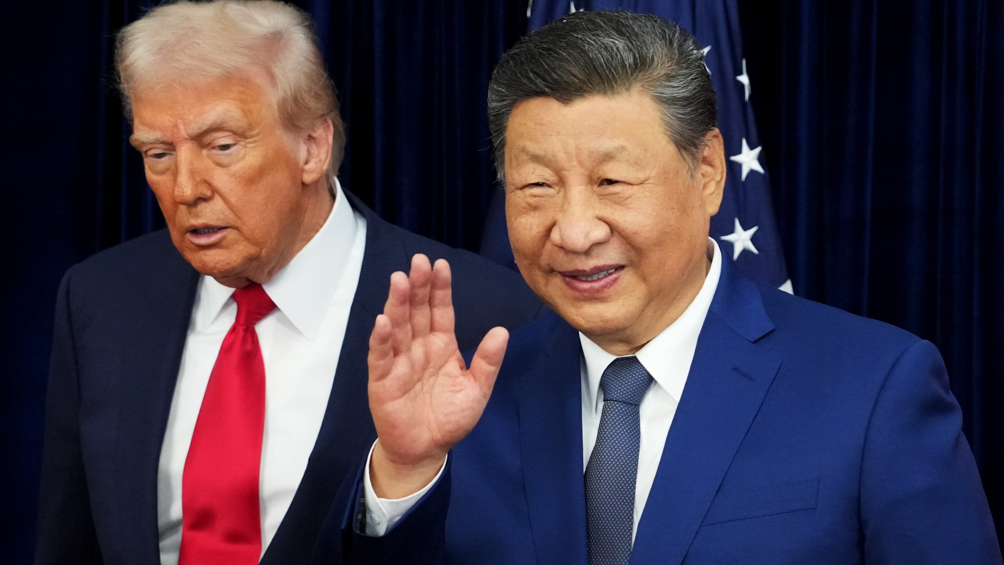 U.S. President Donald Trump and Chinese President Xi Jinping react after posing for photos ahead of a bilateral meeting at Gimhae Air Base on October 30, 2025 in Busan, South Korea.