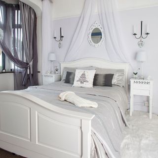 bedroom with white wall and curtain