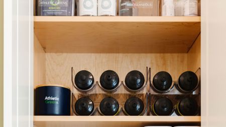 water bottle storage in cupboard