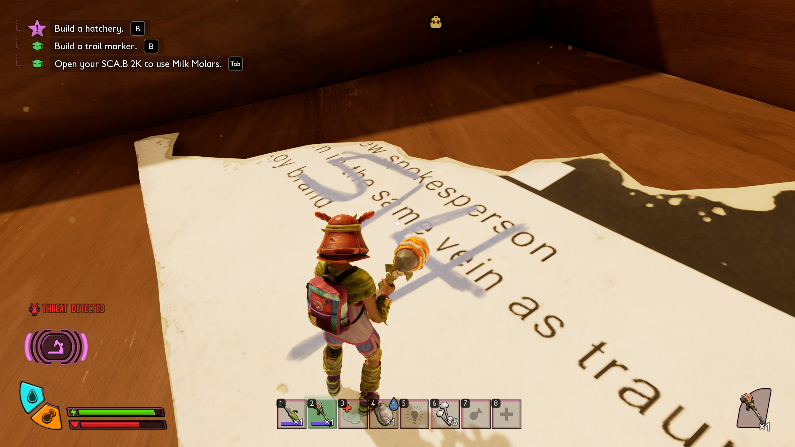 Grounded 2 briefcase code on torn newspaper corner