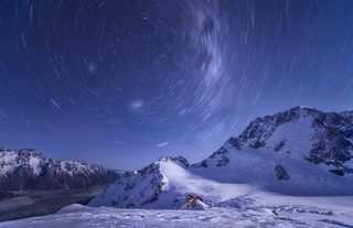 "With temperatures close to -15 degrees, it’s not surprising that the photographer was the only soul in the vicinity of Plateau Hut in Mount Cook National Park, New Zealand. The lonely hut, dwarfed by the snowy mountains of the park, contrasts with the abundance of star trails seemingly encircling the peaks of the Anzac."