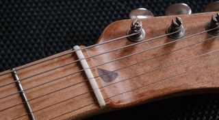 Fixes to make if your new guitar doesn't sound right: from tuners to tremolo units, nuts and string trees, many new guitars need some TLC to make them sound at their best.