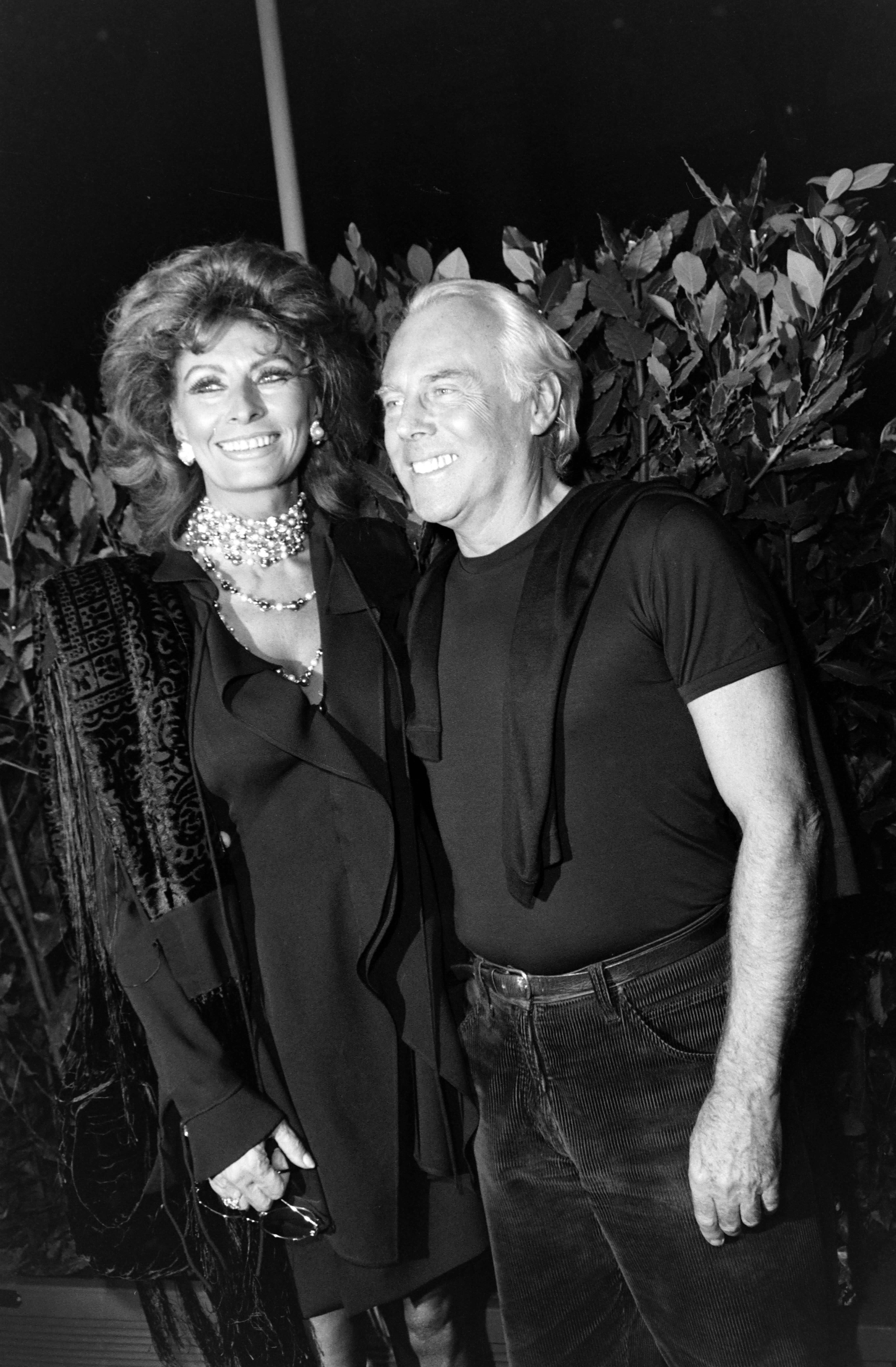 Sophia Loren and Giorgio Armani standing together in Italy