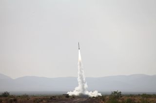 SpaceLoft-5 suborbital rocket speeds into space from New Mexico's Spaceport America on June 21, 2013.