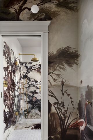 marble bathroom with deep veined brown walls