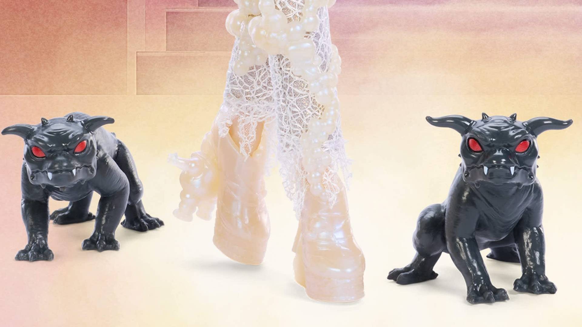 Close up of the Zuul and Vinz Clortho Terror Dogs toys and the heels of the Gozer doll.