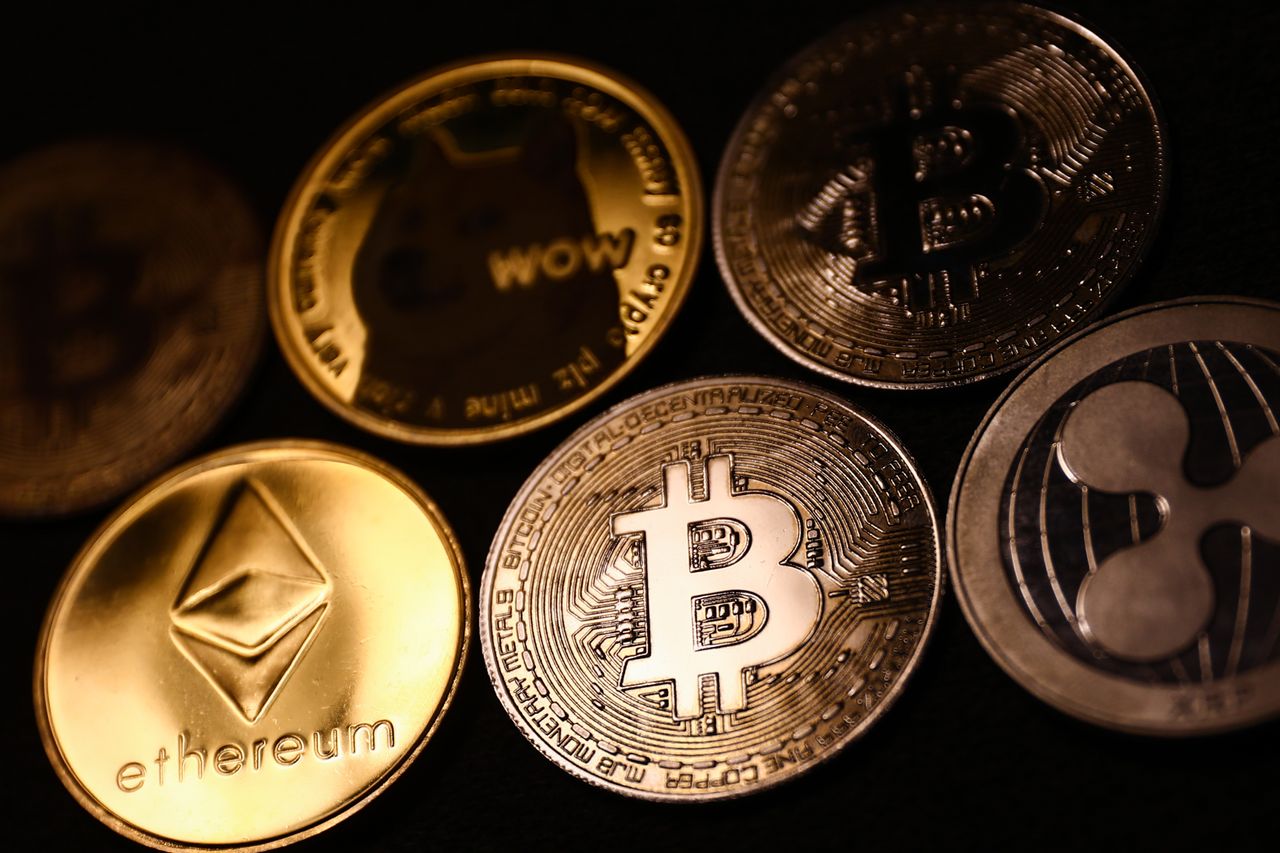 Cryptocurrency coins depicted in an illustration. 