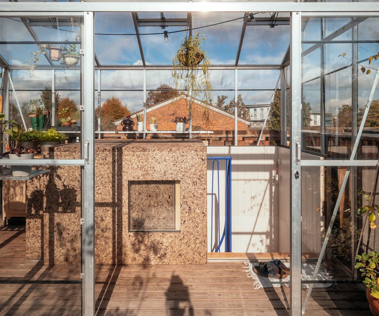 A greenhouse with a stairway access route