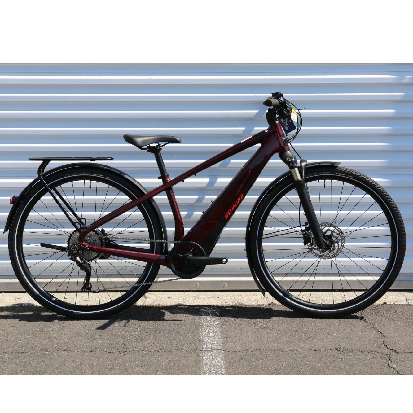 Specialized Turbo Vado 3.0 electric bike with fenders, a rack and lights