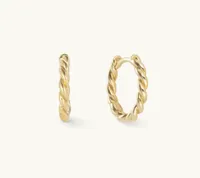 Spells of Love Medium Twist Hoops, $67.48/£60 | Spells of Love