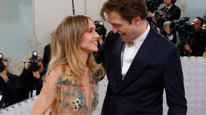 Suki Waterhouse and Robert Pattinson attend the 2023 Costume Institute Benefit celebrating "Karl Lagerfeld: A Line of Beauty" at Metropolitan Museum of Art on May 01, 2023 in New York City.