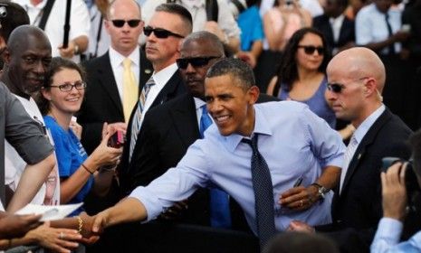 President Obama is guarded by agents as he greets supporters in Florida: The Secret Service scandal brings the entirety of the president&amp;#039;s security into question.